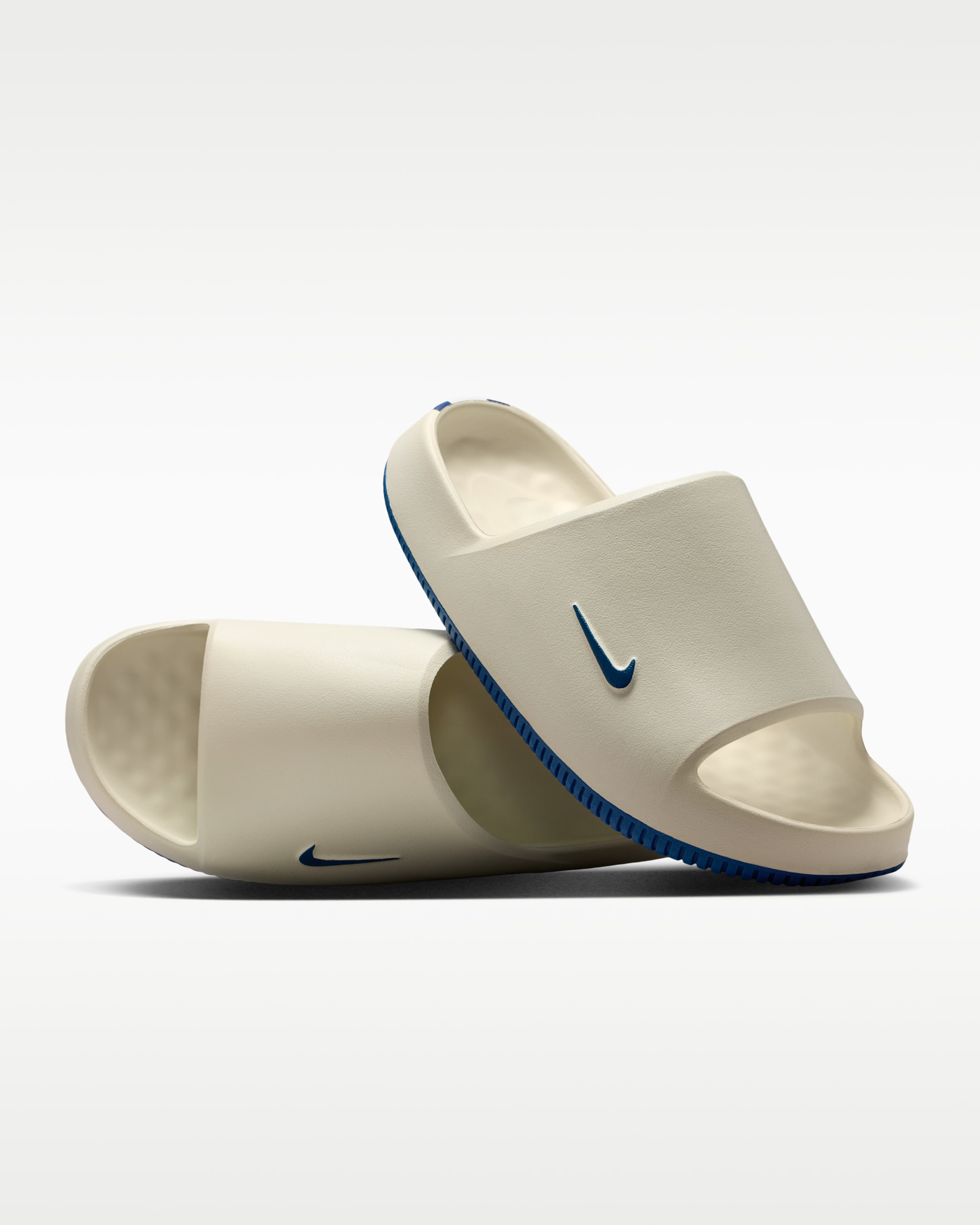 Low32 ④ Nike Calm (Indianapolis Colts) Men's NFL Slides. Nike.com